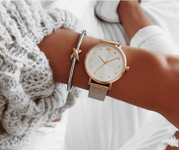 A close-up of a MVMT watch on a woman’s wrist.