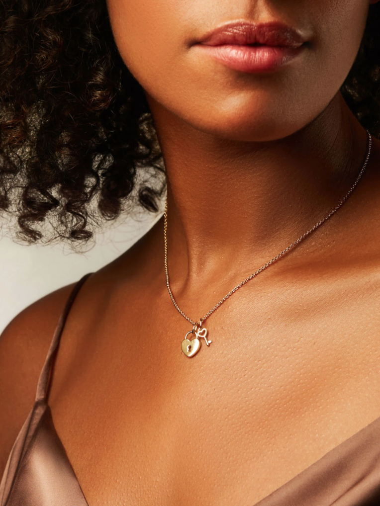 An advertisement for Ana Luisa's Joy necklace.