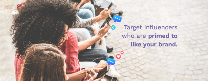 A photograph of a line of people all looking at their phones with the text "Target influencers who are primed to like your brand" superimposed in purple text.
