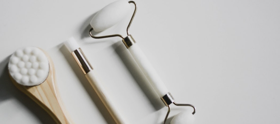 Skincare tools against a white background, by Content Pixie.