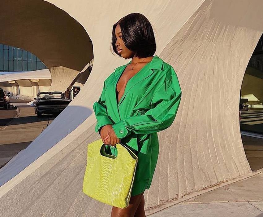 Luxury fashion influencer Nana Agyemang shows off an outfit.