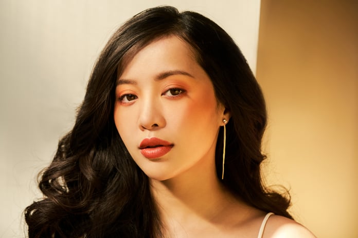 A portrait of EM Cosmetics founder Michelle Phan.