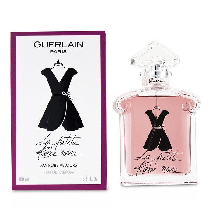 A bottle of Guerlain’s La Petite Robe Noire Velours Fragrance and its box.
