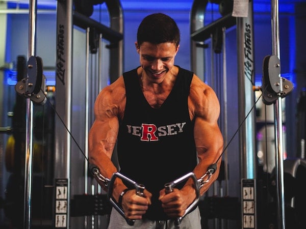 A man in a gym wearing activewear.