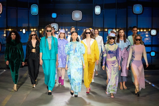 models walk in a runway show for fashion week