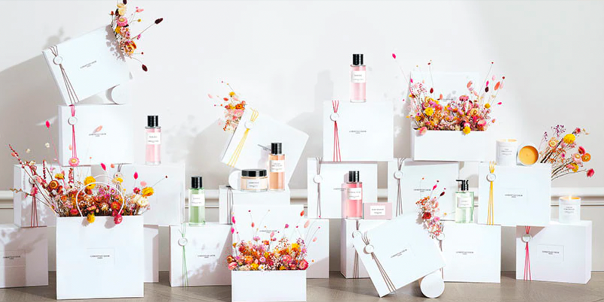 Dior’s Maison Christian Dior luxury fragrance collection displayed with gift packages. 