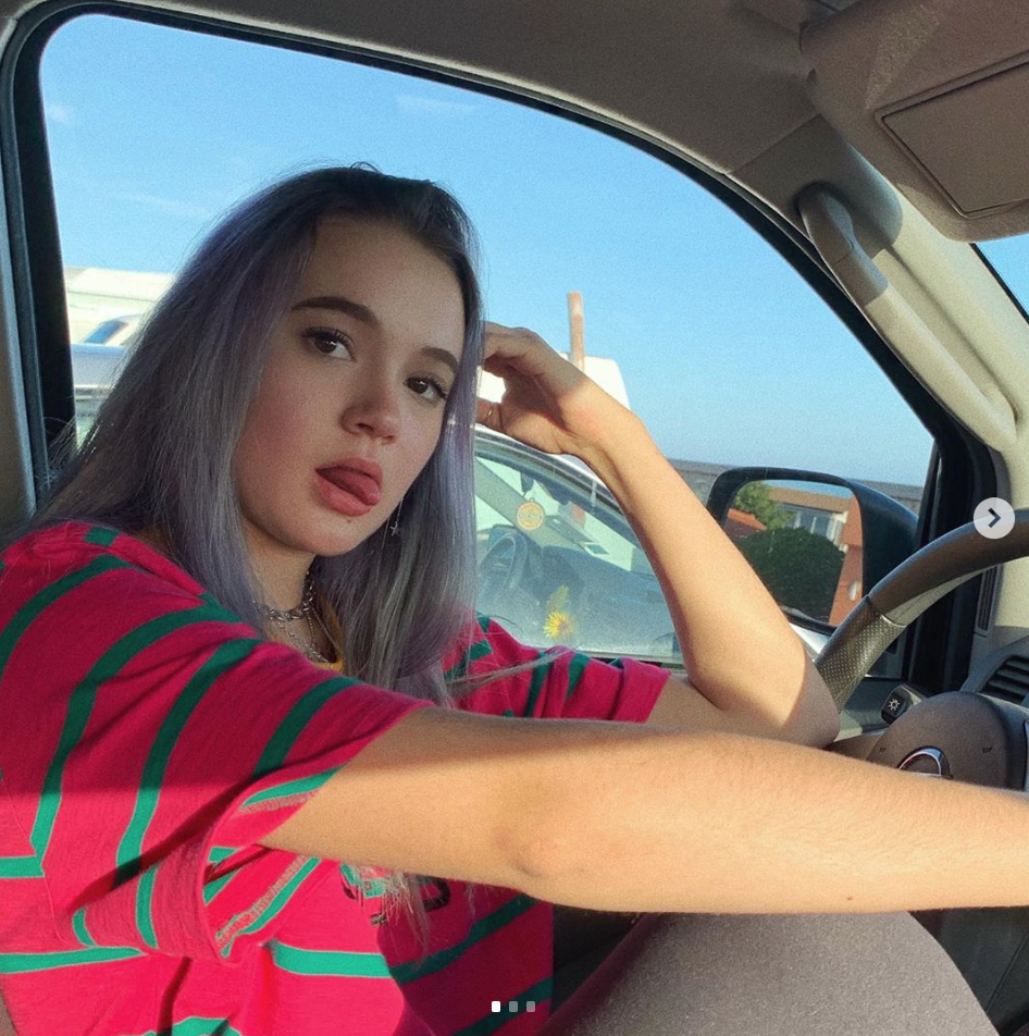 Fiona Frills sits in a car