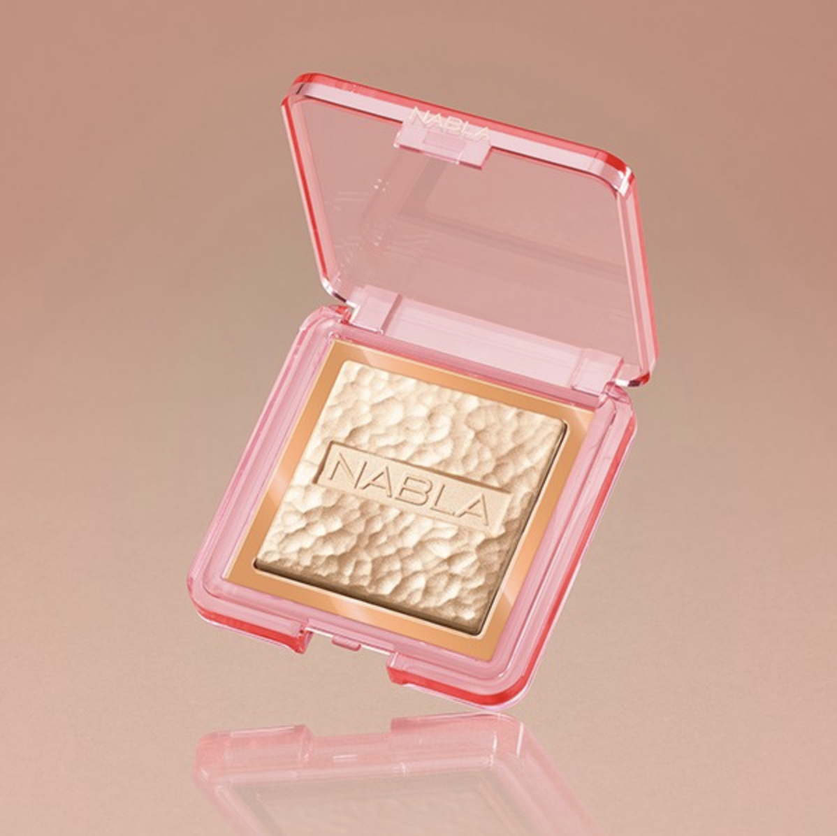 A close-up product shot of Nabla Cosmetics’ Skin Glazing highlighter.